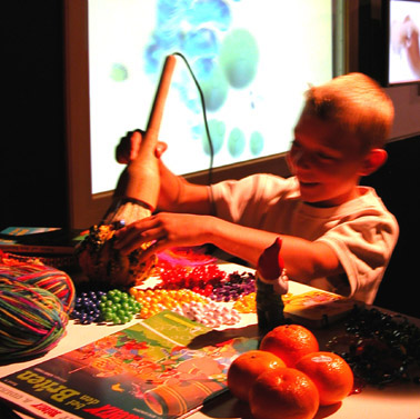 Boy working with I/O brush